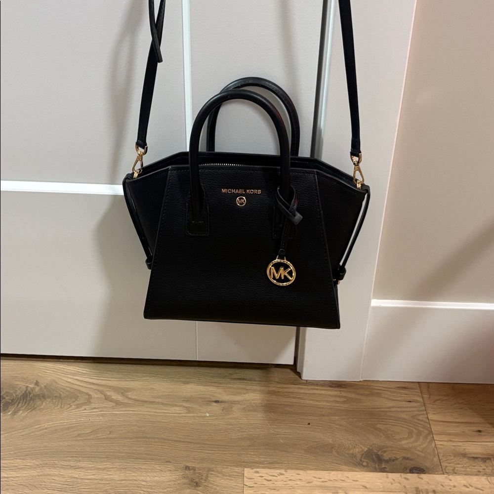 Michael Kors bag. Like new. Took tags off and wore for 1 event 1 hr. Authentic